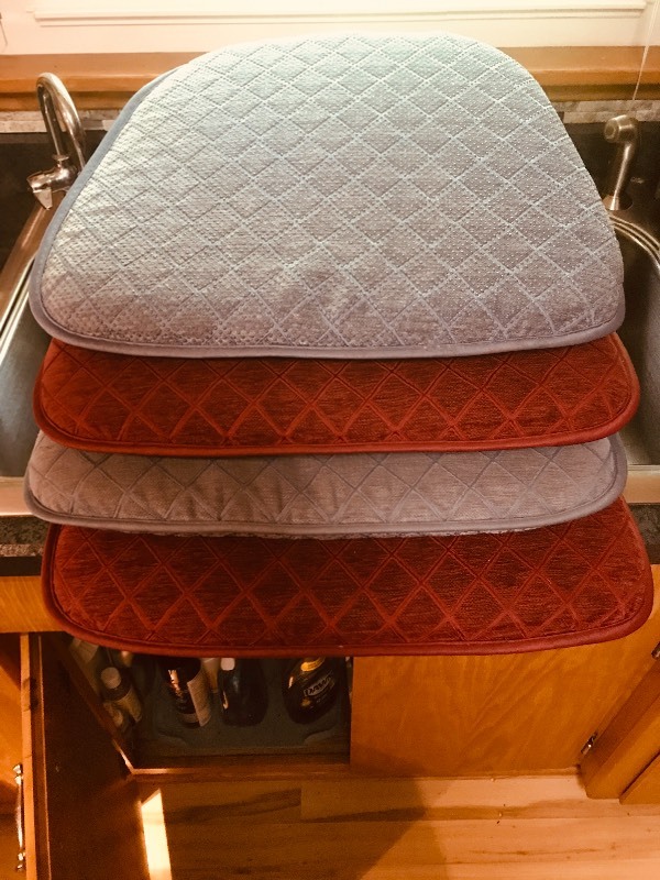 lot 201 image: Assorted Place Mats Seat Cushions