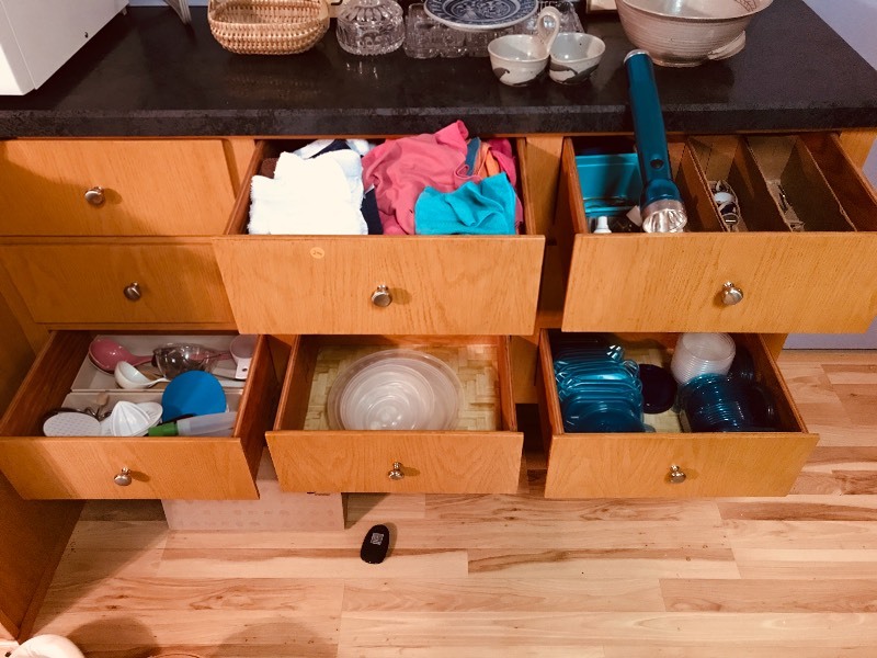 lot 204 image: Mag Light  (5) kitchen Drawers of Kitchen Utensils .