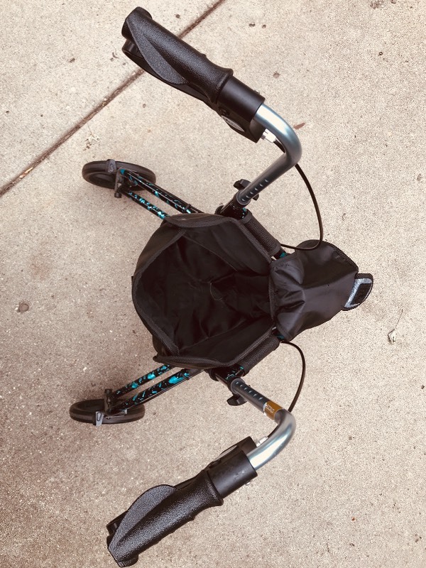 lot 230 image: Tri-Wheel Medical Rolator  Walker by Drive Medical Design and Manufacturing. Adjustable Height with brakes.