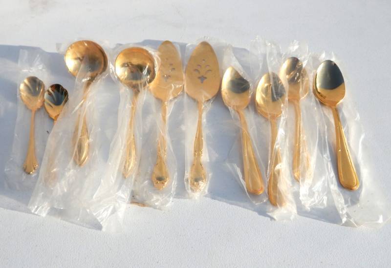 lot 30 image: Lot of New Vintage Gold  Electroplated Oneida Serving Utensils and Spoons