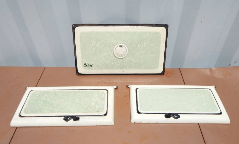 lot 49 image: Lot of Vintage Dixie Cast Iron Stove Porcelain Face Doors