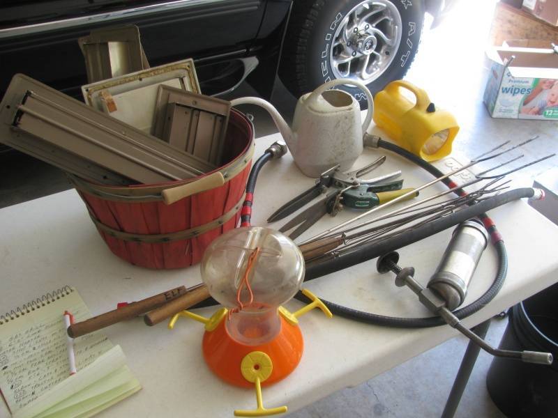 lot 123 image: Flash Light, Shears, Bird feeder # 134