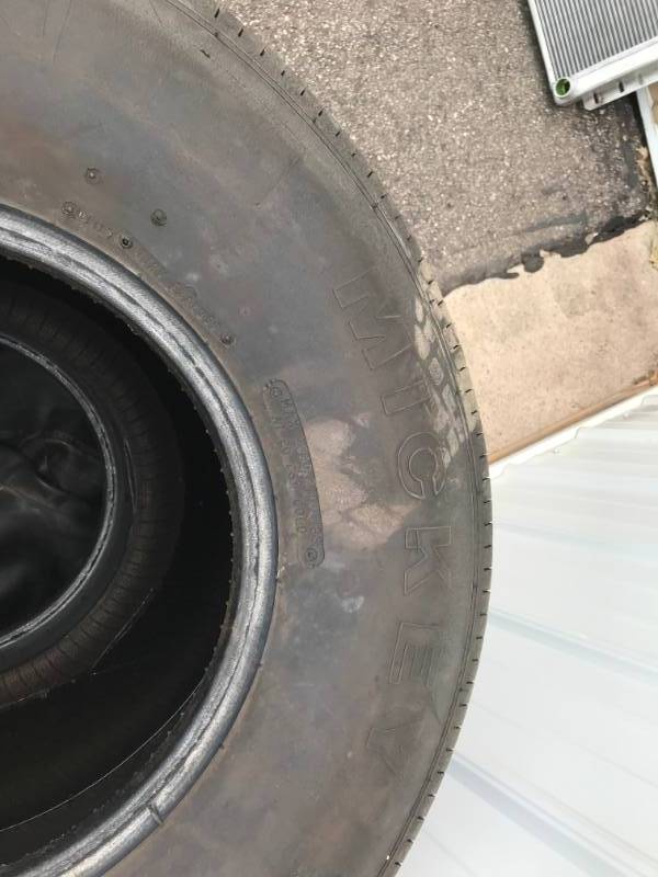 lot 31 image: Lot of (2) Mickey Thompson Sportsman Tires  70% Tread