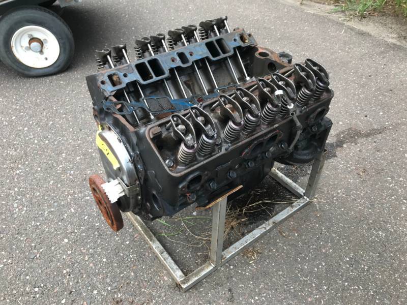 lot 54 image: Chevy Small Block wCamel-back Heads - Cast #3903352