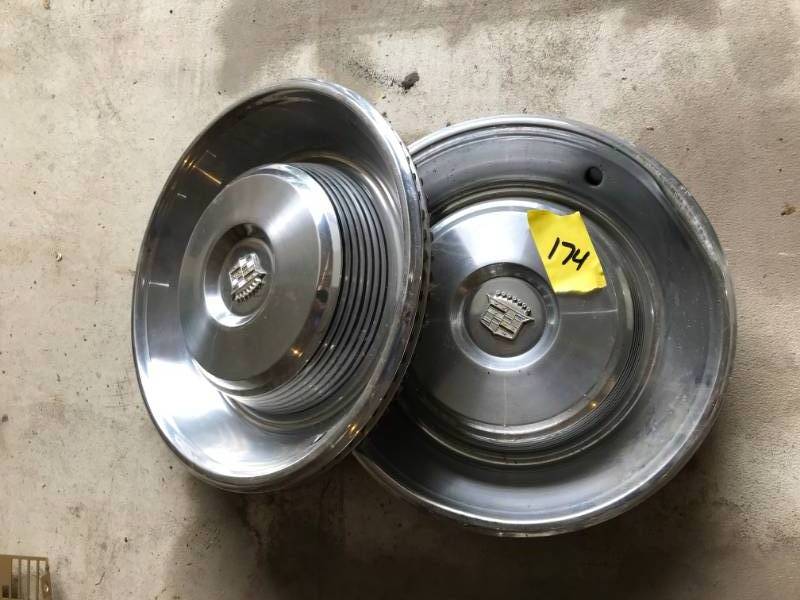 lot 174 image: 1966 Cadillac Hubcaps