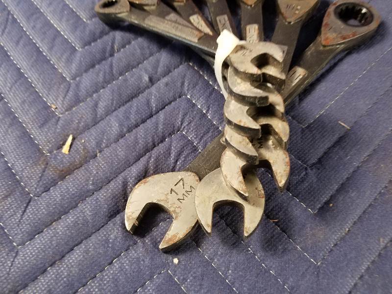 lot 14 image: Saw Blade-Wrenches-Flashlight