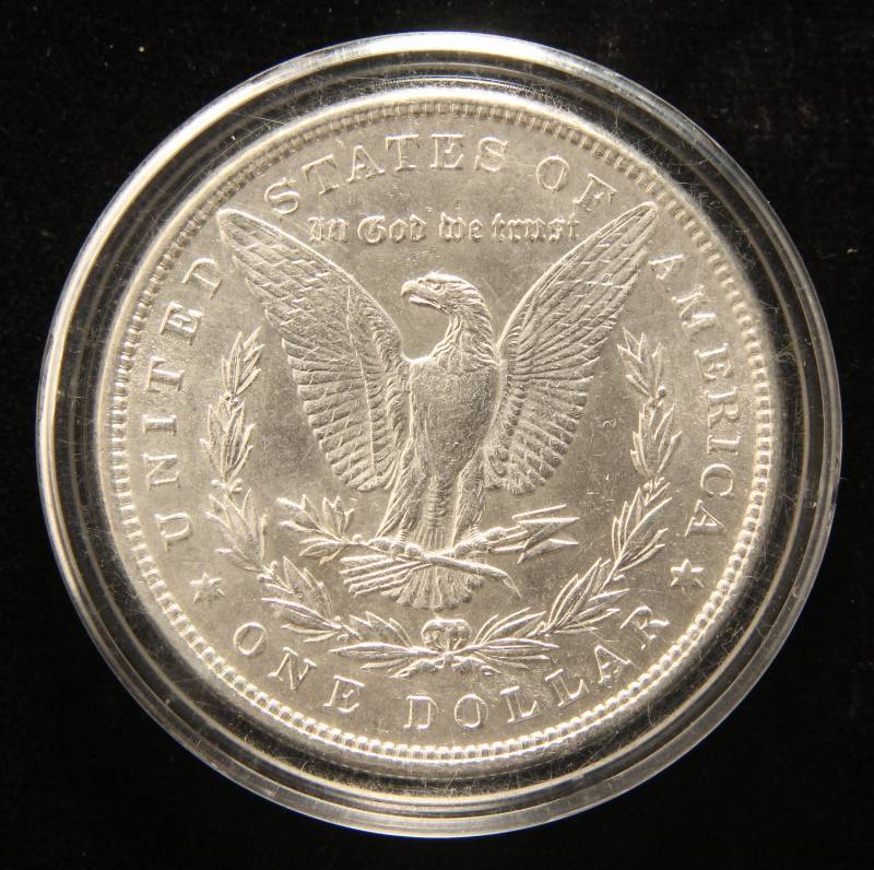 1885 MORGAN SILVER DOLLAR UNC IN AIRTITE