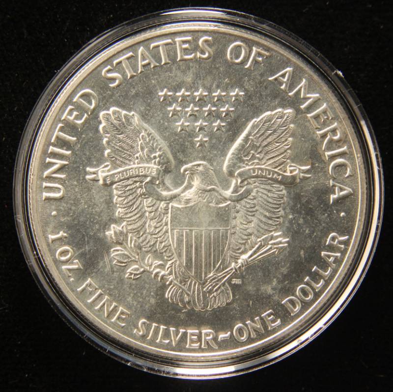 1987 AMERICAN SILVER EAGLE 1 TROY OZ. .999 FINE SILVER IN AIRTITE