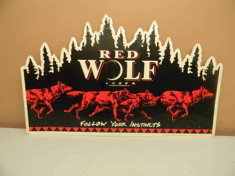 lot 57 image: RED WOLF TIN BAR SIGN - SEE PICTURES