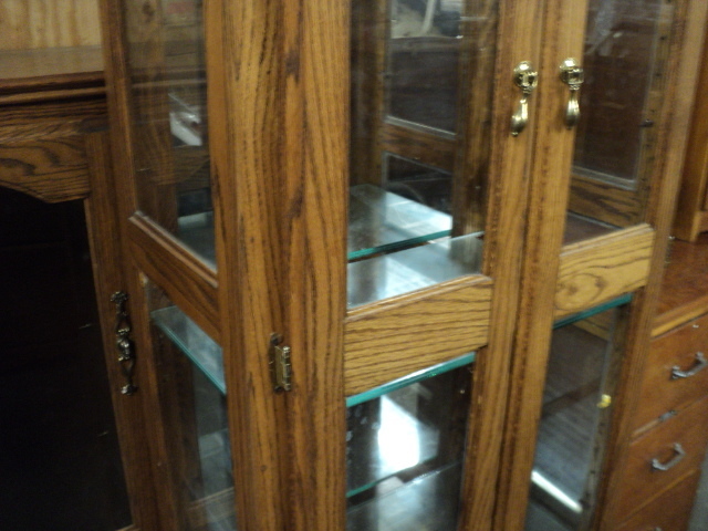 wood lighted curio cabinet with gla...