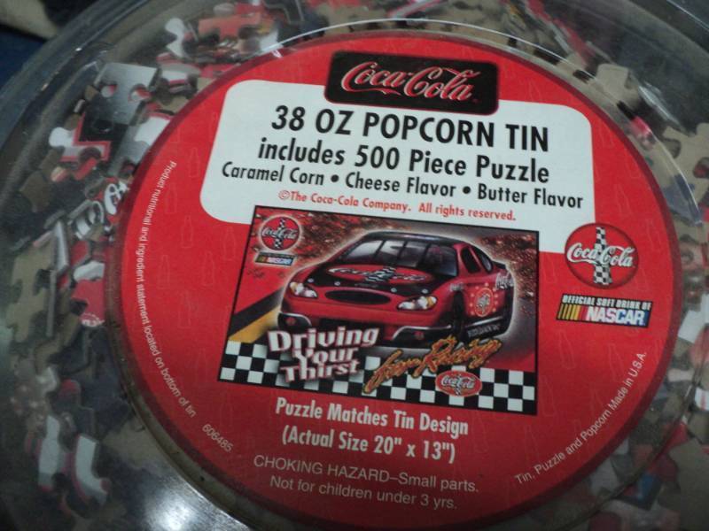 Coca Cola Tin with Puzzle...