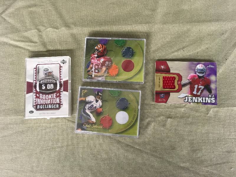 lot 378 image: Four NFL Game Worn Jersey Cards