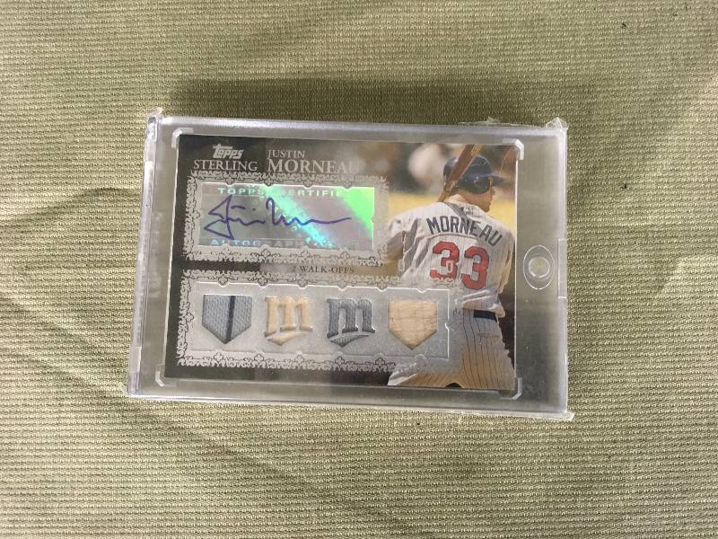 lot 383 image: Autographed Justin Morneau Game Used Jersey Bat Card 0410