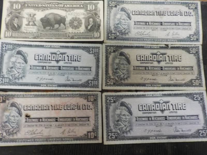 10 Dollar Bill and Canadian Paper M...