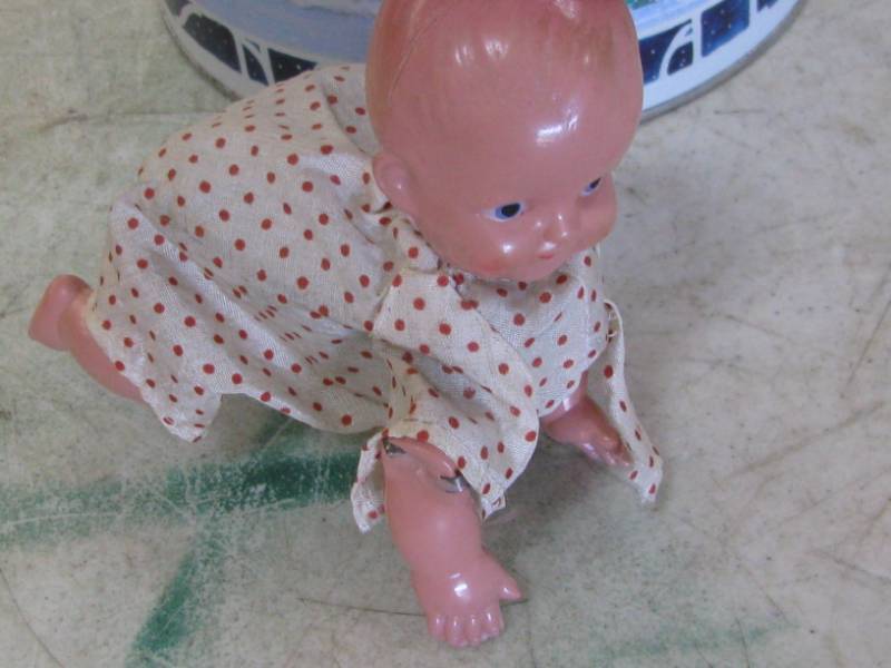 lot 73 image: Wind Up Doll