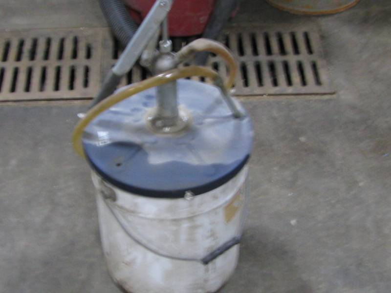 lot 90 image: Grease Can with Pump