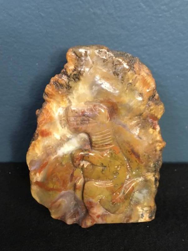 lot 112 image: Carved Dinosaur Dung