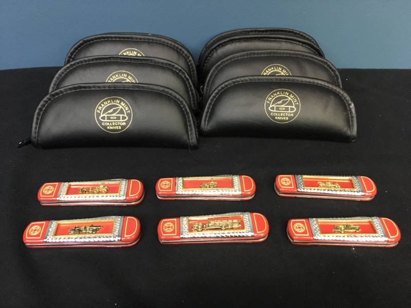 lot 150 image: Franklin Mint Fire Trucks Knifes