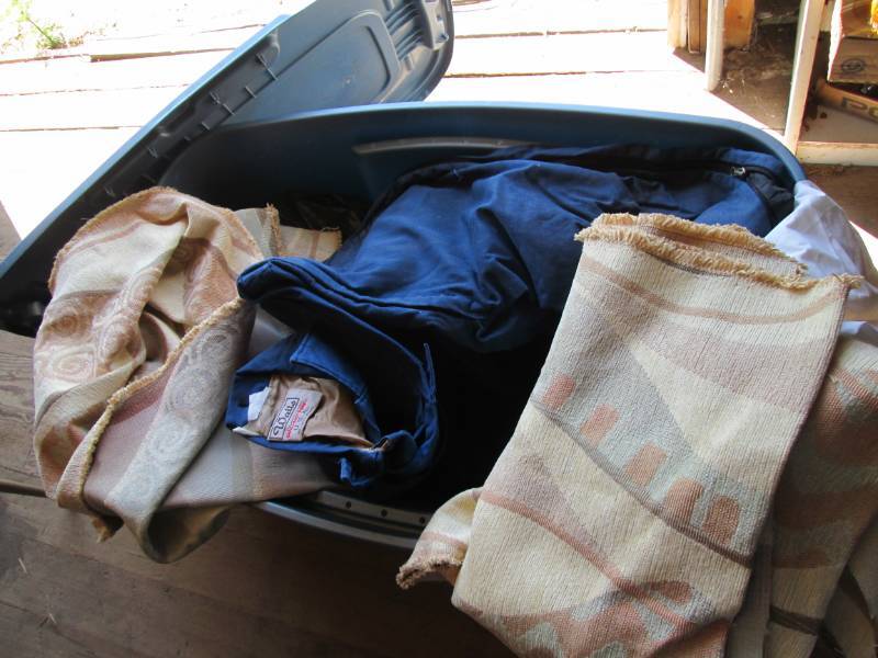 lot 12 image: Old material and tote...