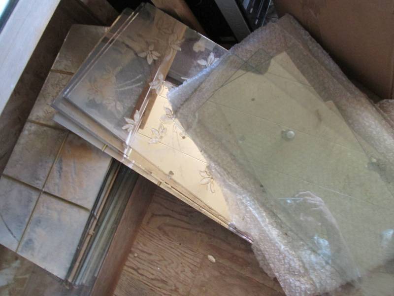 lot 51 image: Mirrors and glass shelves...