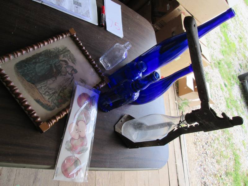 lot 75 image: Colbalt blue bottles and bottle cap...