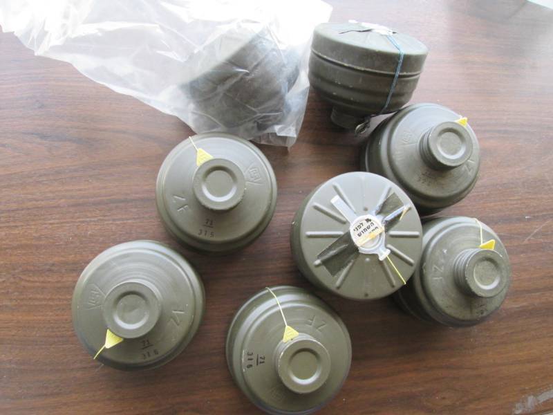 lot 80 image: 8 gas mask filters for Israeli gas ...