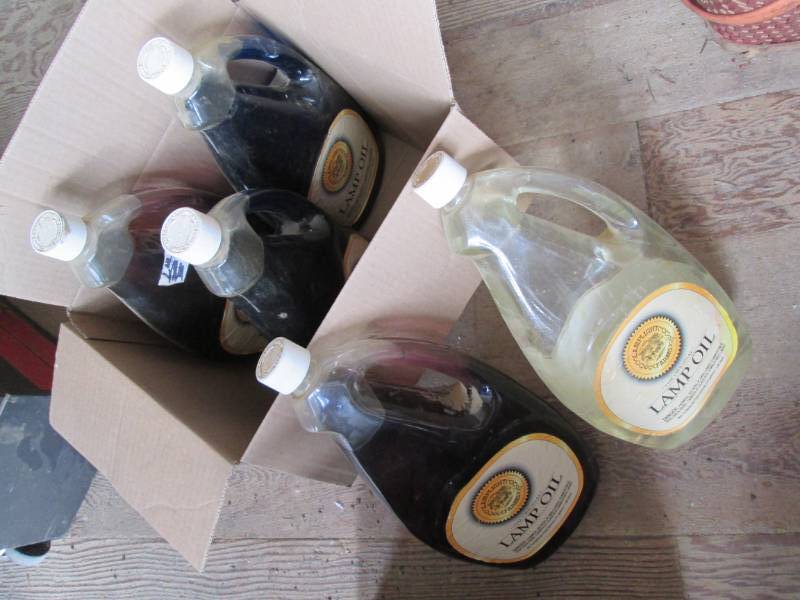 lot 85 image: 5 1.5 Gallon oil bottles...