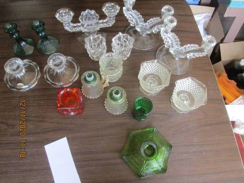 lot 180 image: Assorted candle holders...