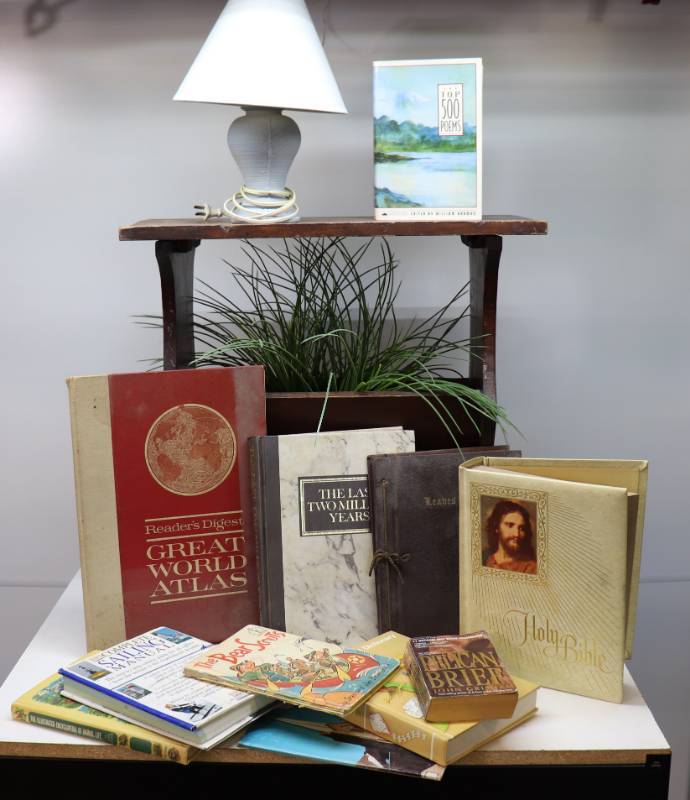 Nightstand, Lamp & Old Books