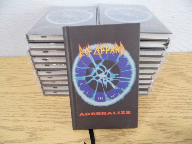 lot 18 image: Lot of 20 Def Leppard Blank Books