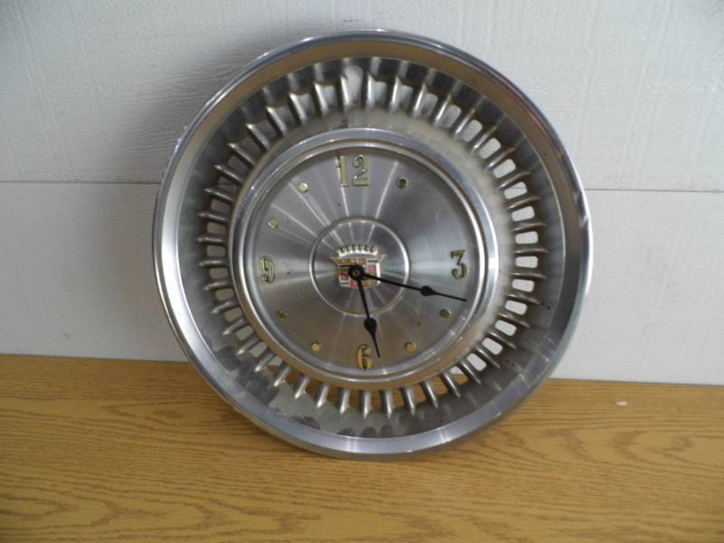 lot 115 image: Cadillac Hubcap Clock