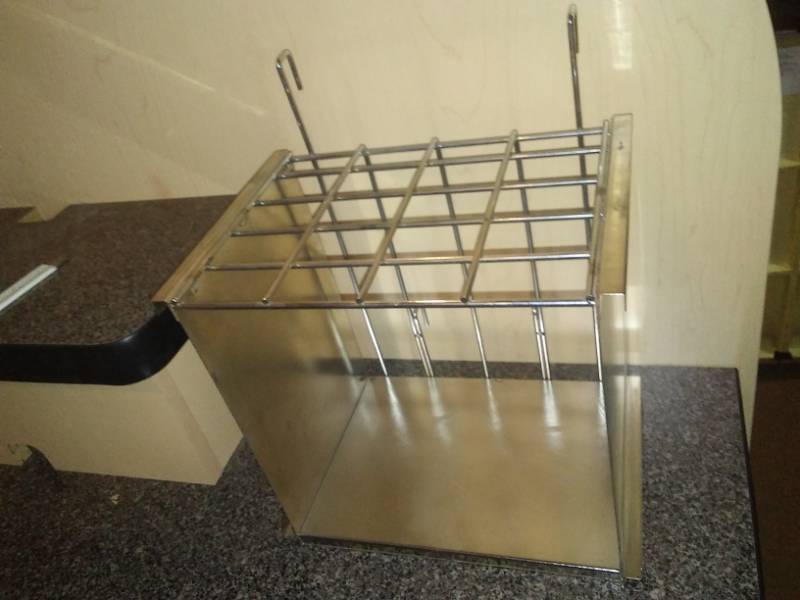 lot 7 image: Chrome hanging shelf.