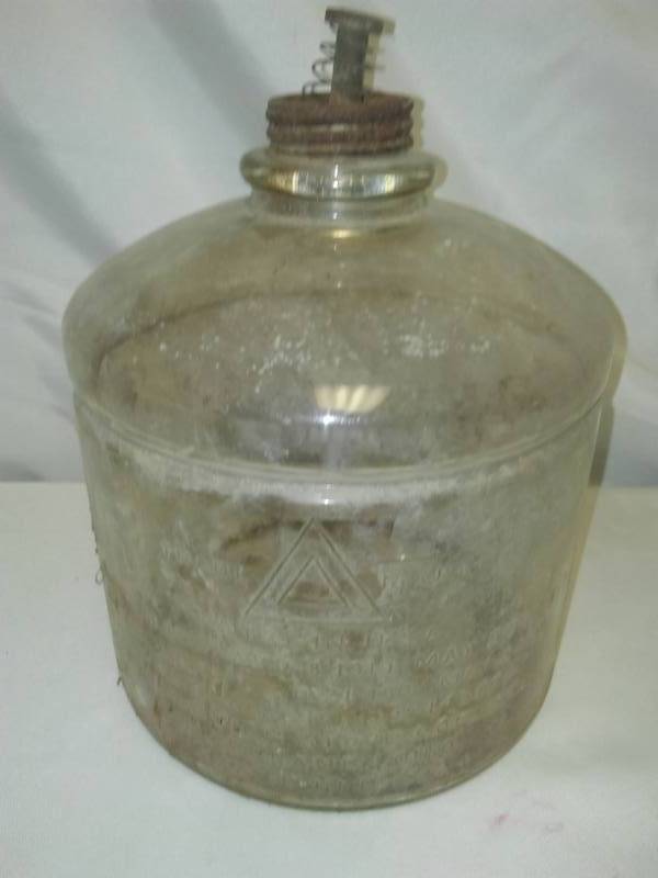 lot 30 image: Antique glass jug for lantern.