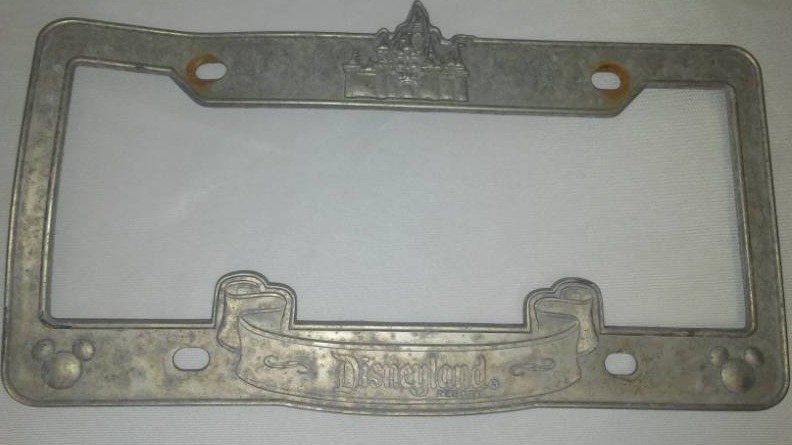 lot 96 image: Disneyland license plate bracket holder