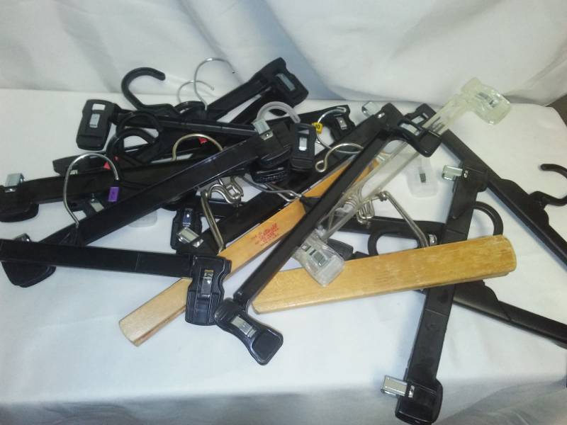 lot 98 image: Commercial clothing hanger clip and clamp - dozens.