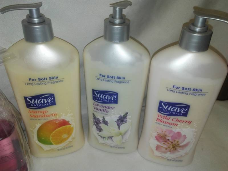 lot 111 image: Suave body lotion - 6 and gift packs- 2.