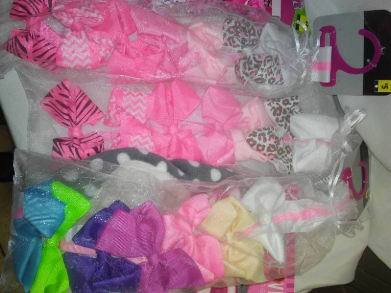 lot 113 image: Miscellaneous NEW - hair bows, women socks and more.