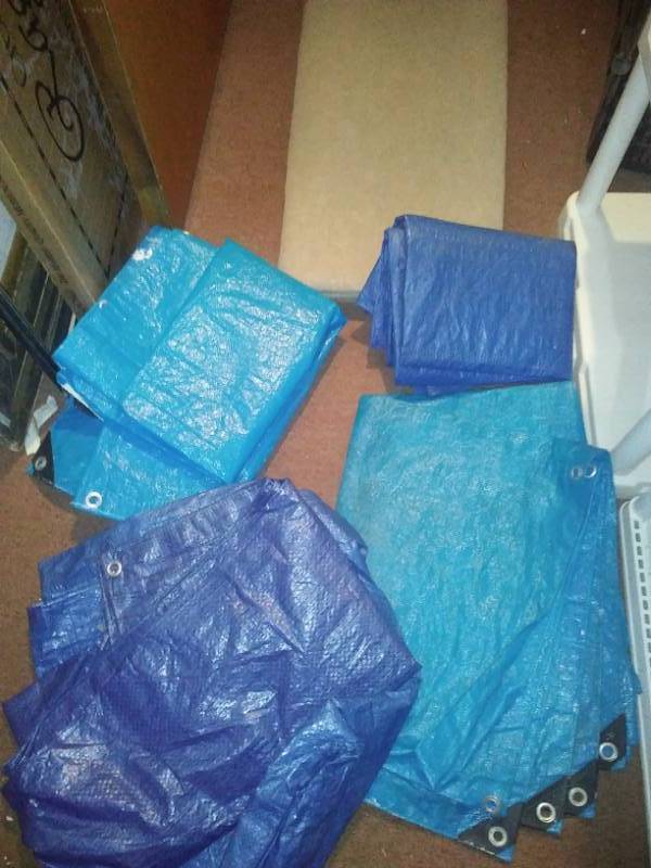 lot 134 image: Tarps and carpet.