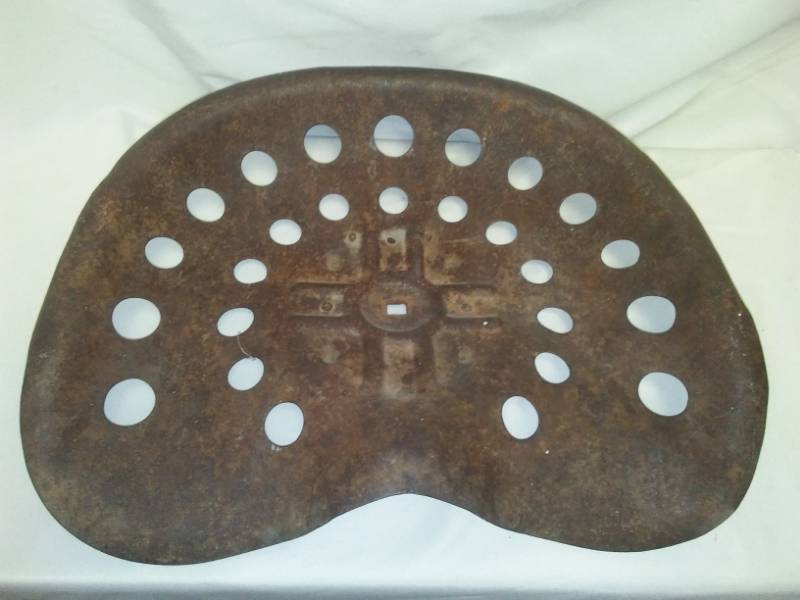 lot 143 image: Metal tractor seat, 18 in wide