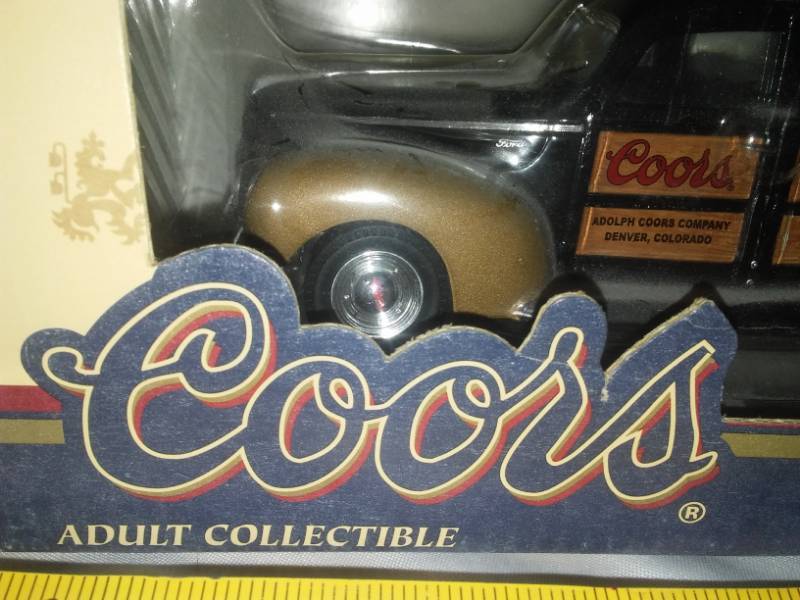 lot 152 image: 1940 Ford Woody Wagon Bank Adolph Coors Brewing Company.