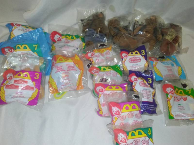 lot 164 image: 18 Happy Meal toys in bags