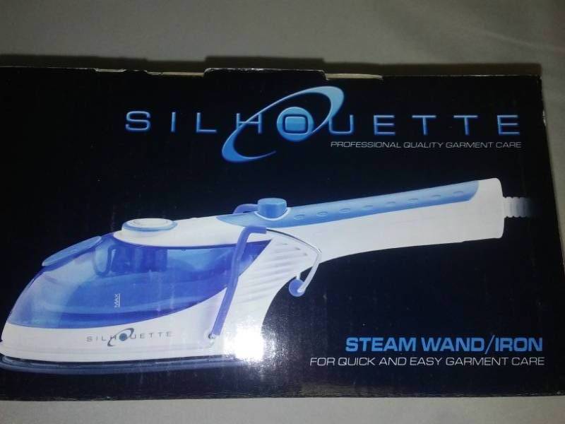 lot 63 image: Silhouette steam wand and iron.