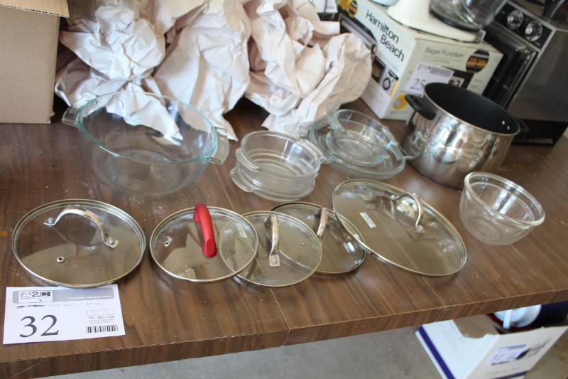 lot 32 image: Pyrex Bowls and Glass Cooking Pot Lids