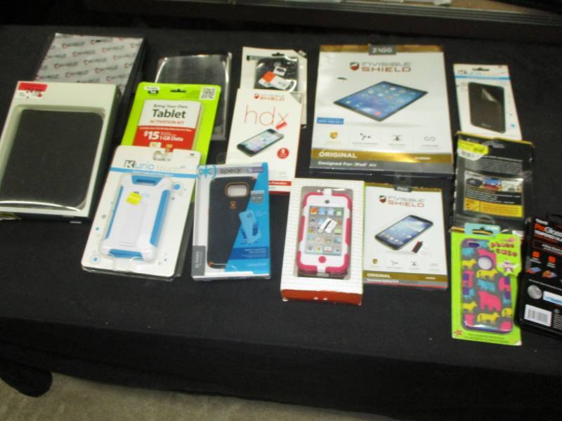 lot 18 image: Ipad and phone Protector Screens and Phone cases