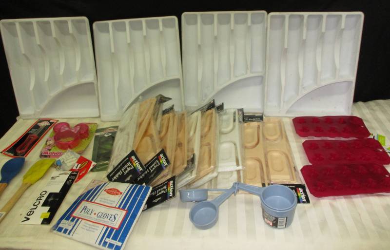 lot 33 image: Spatulas, Paper Towel Holders, Duck Icecube trays, Measuring Cups, Picnic Table Cover Holderss and Poly Glove