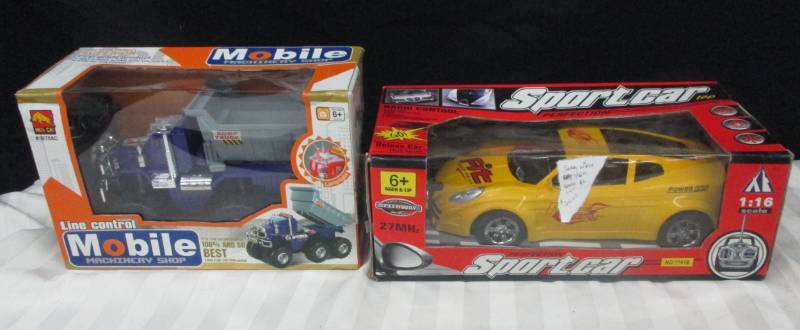 lot 50 image: 1 Line Conytrol Dump Truck, 1 Line Control Race Car