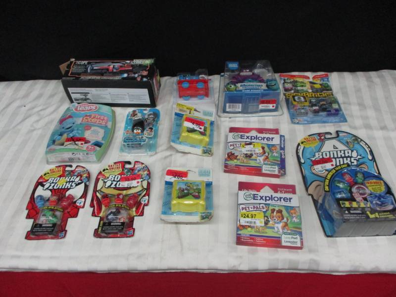 lot 95 image: Assorted Unopened Movies and Leapster Learning