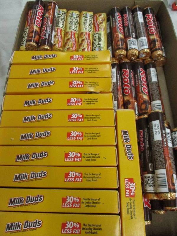 lot 154 image: 43 Milk Duds Rolos and Werthers Originals