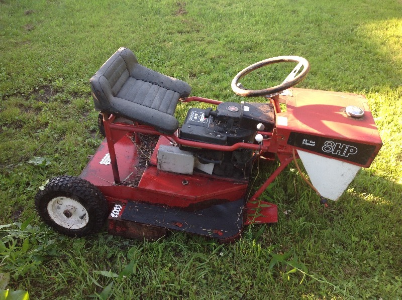 8 HP Ride King Mower Bakke Moving Sale 1 of 2 KBID