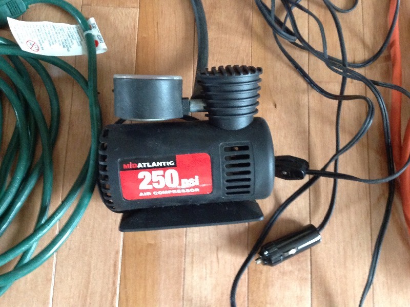 lot 41 image: Sprinklers, Ext Cords & Small Air Pump